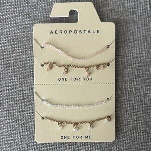 NWT - Aeropostale Gold and Pink Charm Bracelet/Anklet Duo